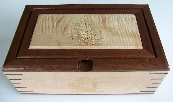 wood box with 5 ship carvings