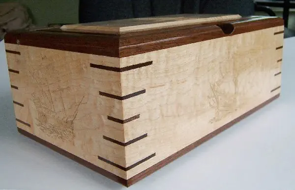 wood box with 5 ship carvings