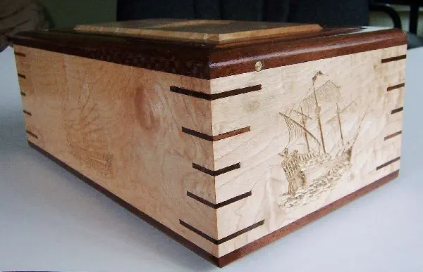 wood box with 5 ship carvings