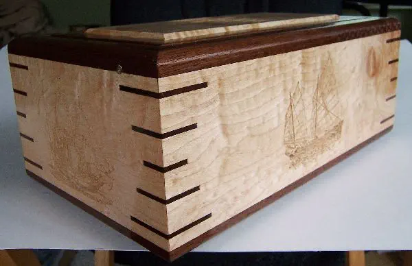 wood box with 5 ship carvings