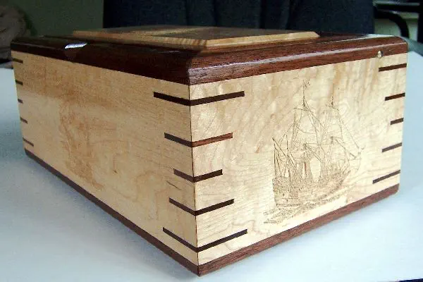 wood box with 5 ship carvings