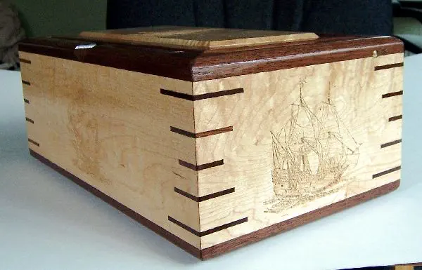 wood box with 5 ship carvings
