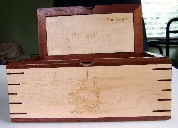 wood box with 5 ship carvings